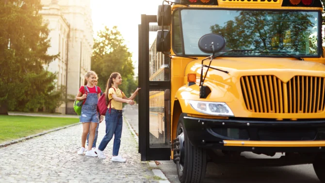 group-of-happy-kids-boarding-yellow-school-bus-aft-2025-03-18-17-09-39-utc